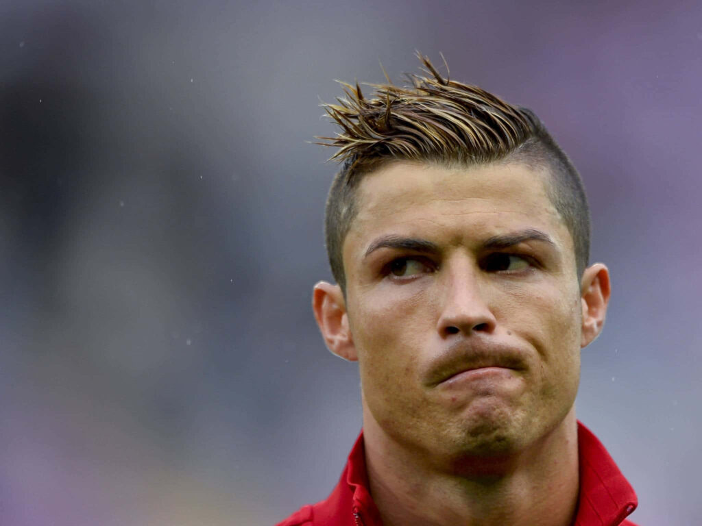 Intense Cristiano Ronaldo Wallpaper: Iconic Close-Up Background