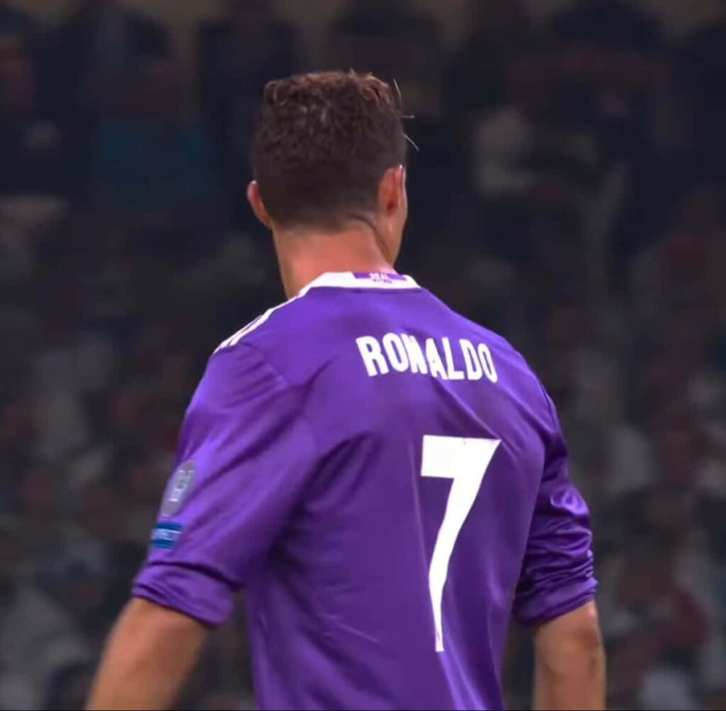 Vibrant Purple Cristiano Ronaldo Wallpaper with Iconic Number 7