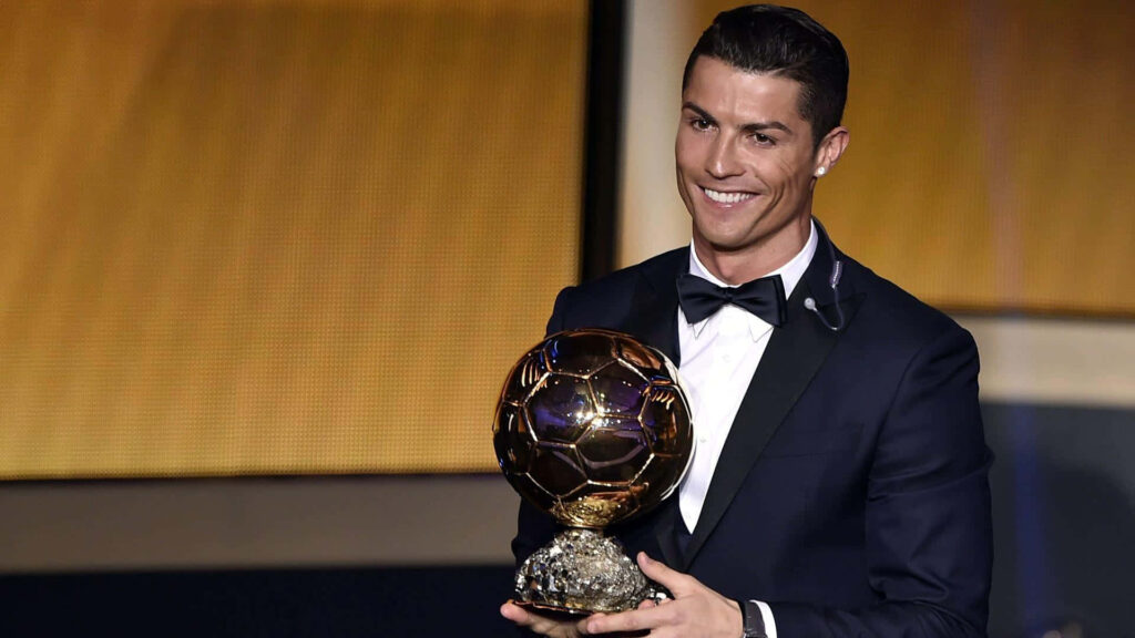 Cristiano Ronaldo Wallpaper: Elegant Design with Golden Trophy