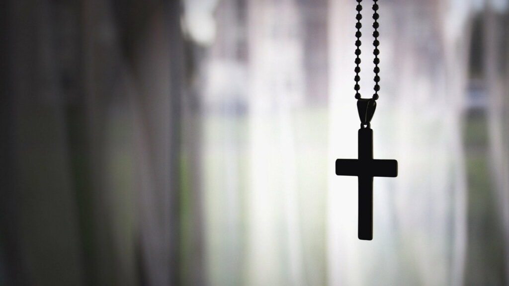 Divine Symbolism: Detailed Closeup of a Cross in HD Wallpaper