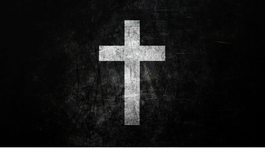 Divine Illumination: A High-Definition Wallpaper Capturing the Magnificence of a Cross in a Lustrous Black Background
