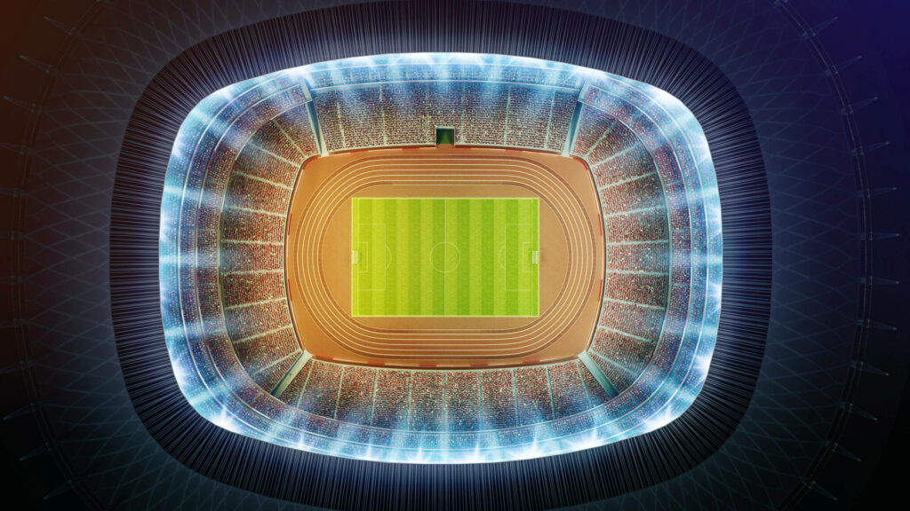 Crowded Stadium: A Vibrant Sporting Scene Captured in 2560x1440 Resolution Wallpaper