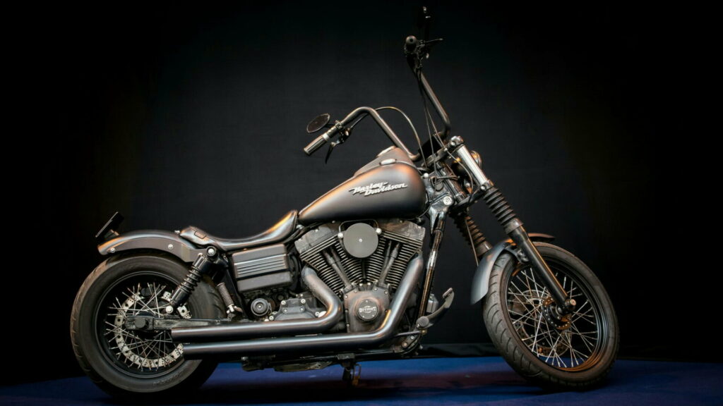Riding into the Sunset: A Majestic Harley Davidson Cruiser Motorcycle in HD Wallpaper