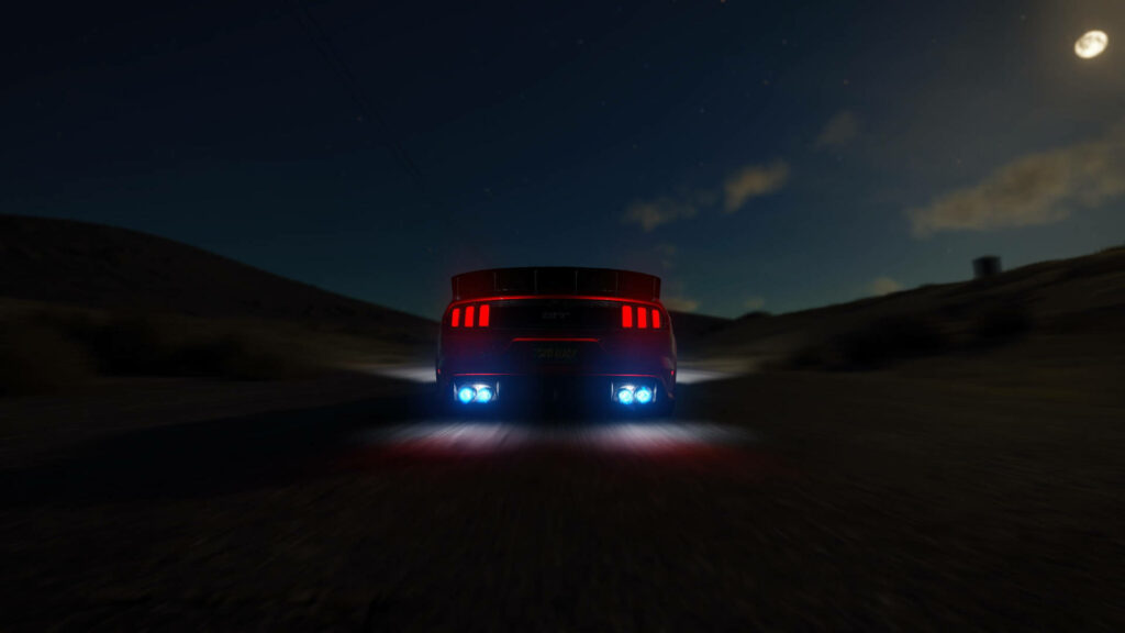 Nighttime Crusade of a Mustang: Red and Blue Illuminated Streaks Piercing Through Cloudy Darkness Wallpaper