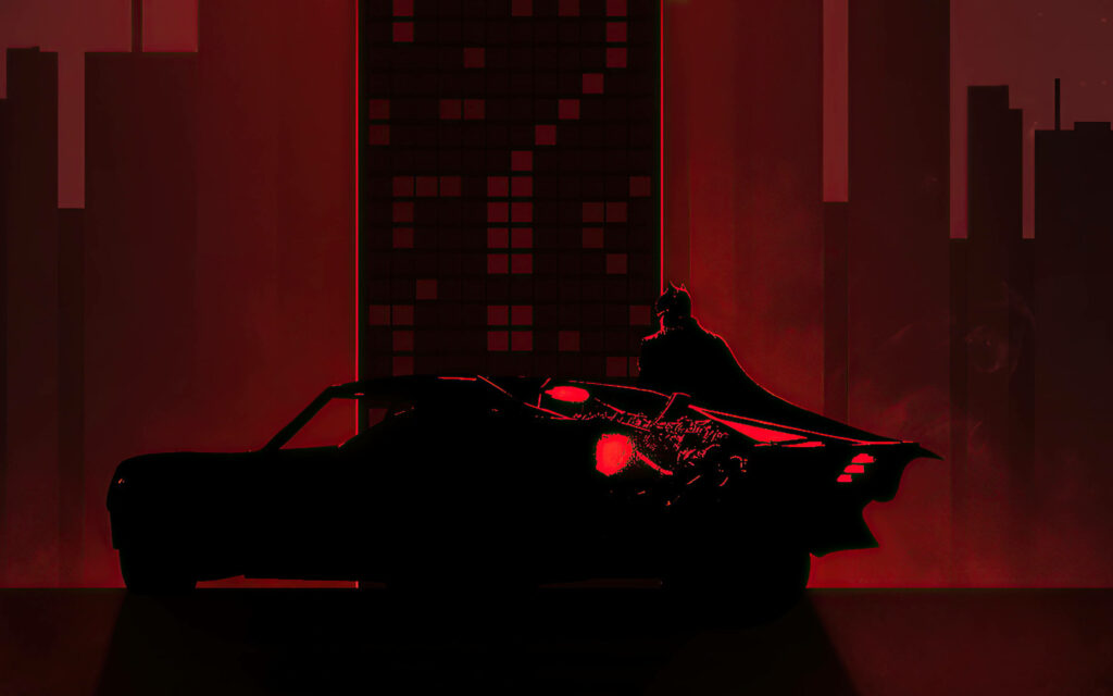Red-Lit Gotham Cruise: Batman and the Batmobile Illuminate the Night Wallpaper