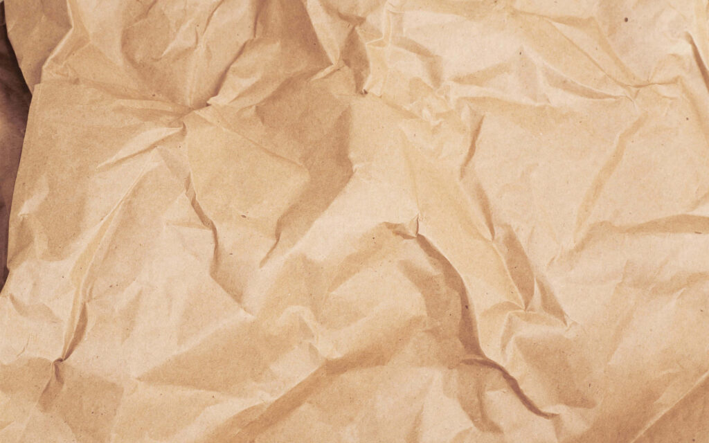 Crumpled Paper's Visual Allegory of Conceptual Transience Wallpaper