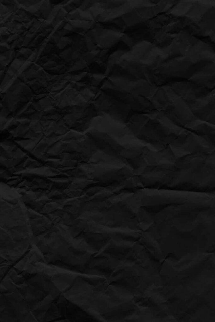 Minimalist Crumpled Black Paper Texture Wallpaper for Dark Aesthetics