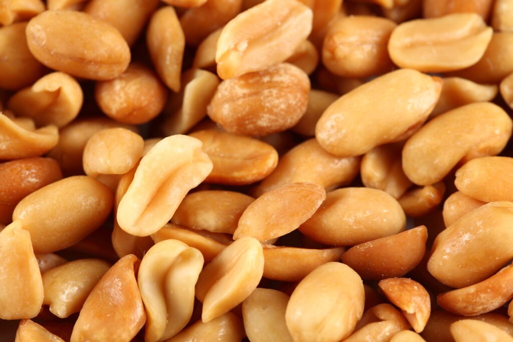 Crunchy Golden Brown Roasted Peanuts - Nutritious Snack Wallpaper