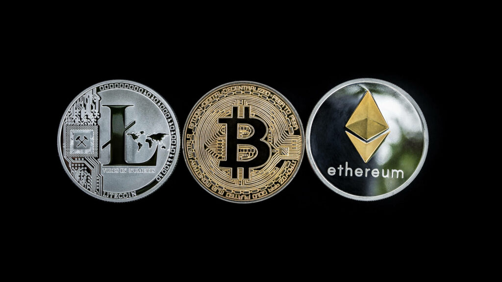 Cryptocurrency wallpaper with Litecoin Bitcoin Ethereum coins metallic texture on black background