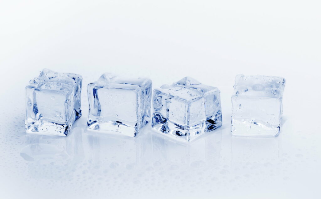 A Closeup of Transparent Frozen Water Drops on Ultra-Clear Ice Cubes for an Icy Wallpaper Background Photo