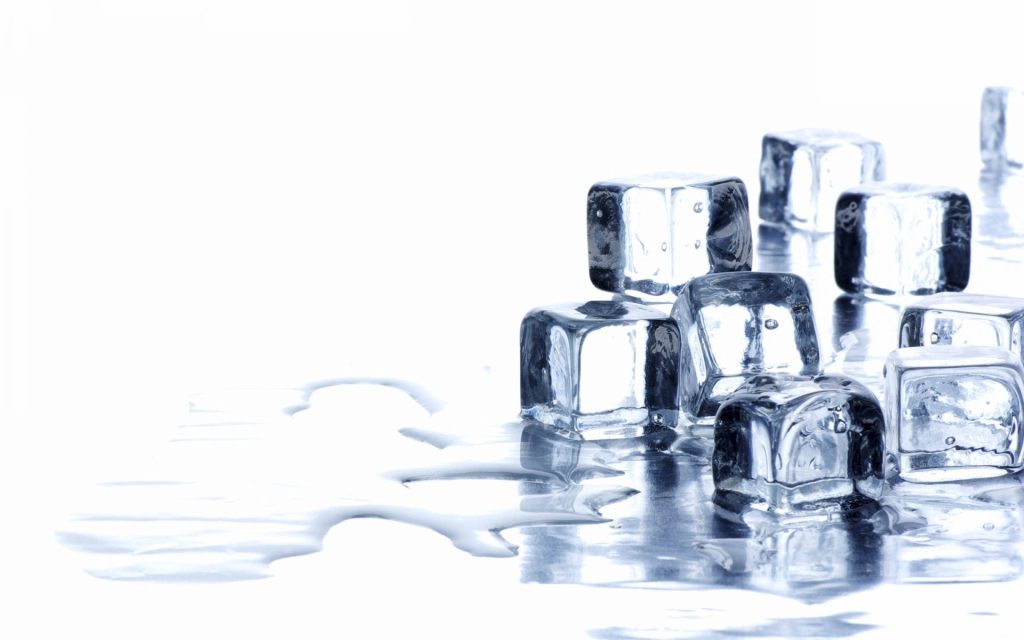 Minimalist wallpaper of crystal-clear melting ice cubes on bright white surface with reflections