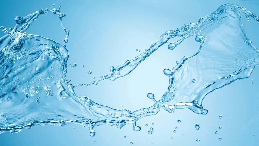 Crystal clear water splash in vivid blue hues with fluid motion for modern wallpaper background