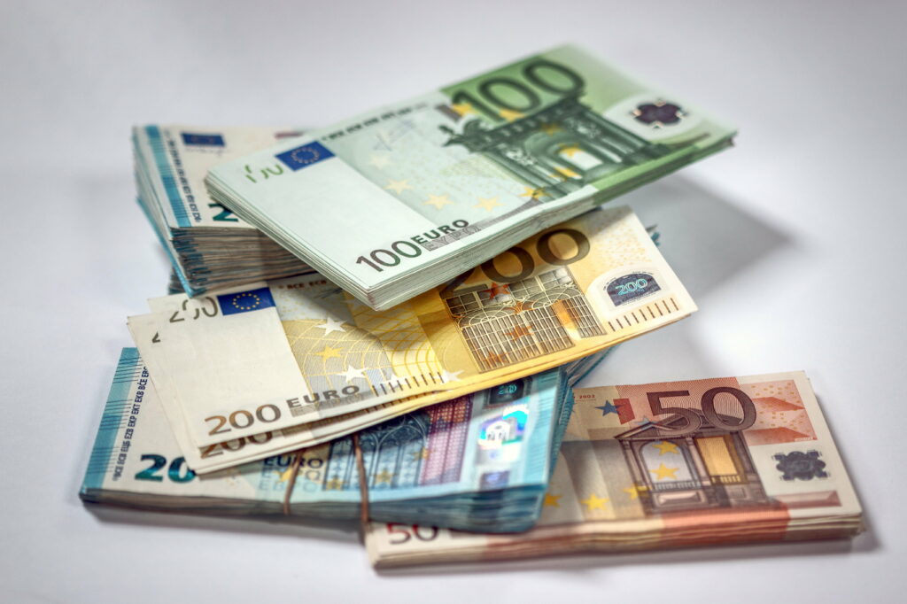 Financial Wealth: Euro Currency Bills Displayed in Stunning 5K Wallpaper Background