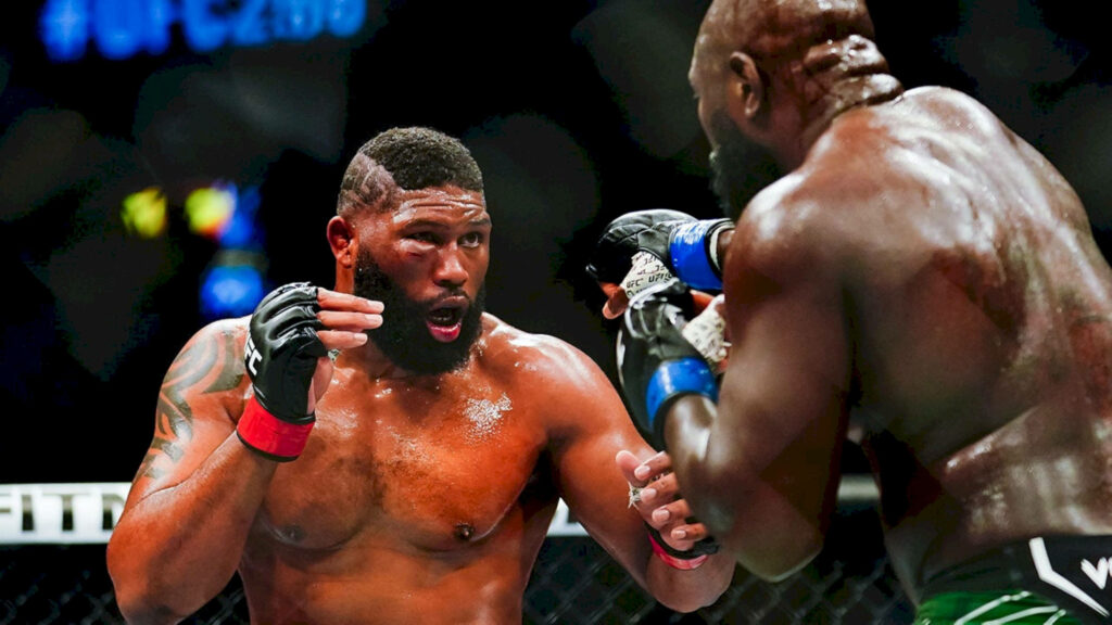 Curtis Blaydes intense UFC fight moment vibrant arena lighting athletic physique MMA action wallpaper