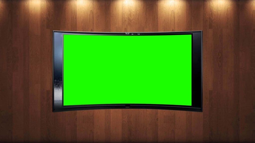 Curved monitor with bright green chroma key screen on dark wood wall in broadcast studio lighting Wallpaper