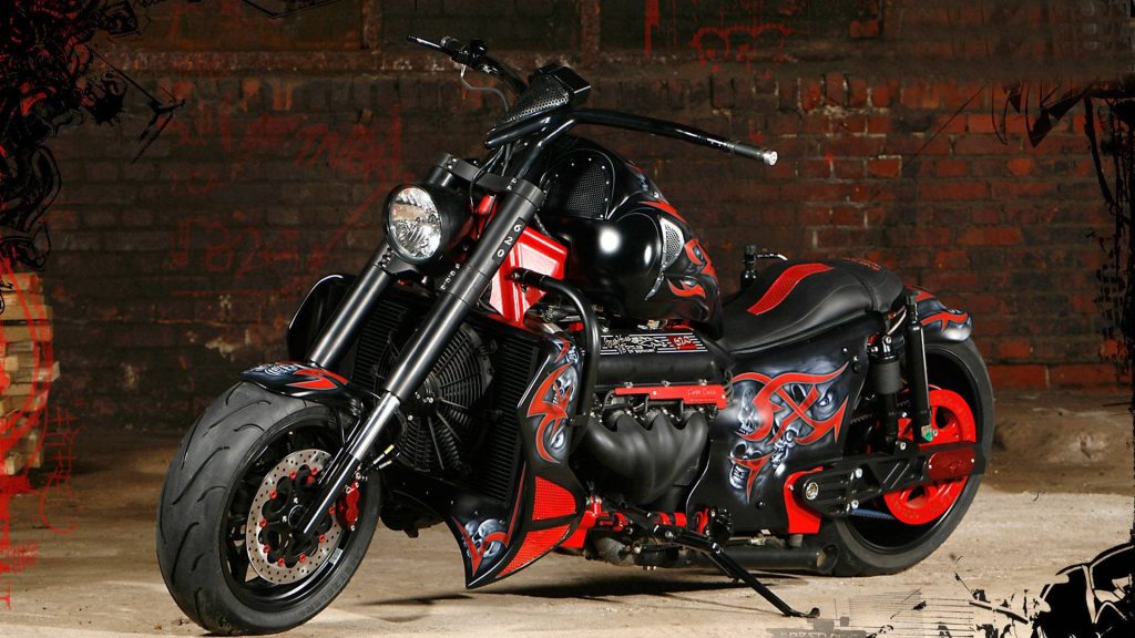 Custom Boss Hoss V8 motorcycle with black red skull design and bold rims on brick wall background Wallpaper