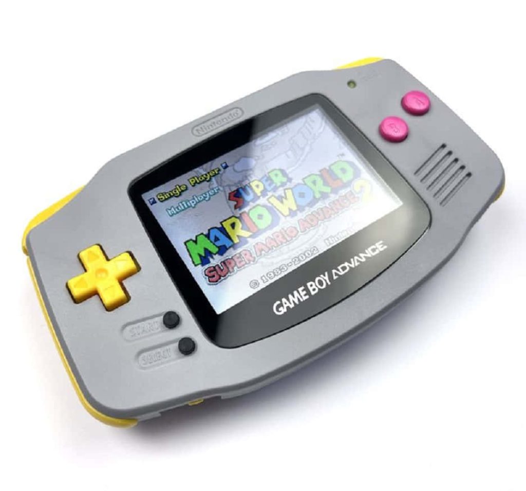 Custom grey yellow Nintendo Game Boy Advance showing Super Mario World Super Mario Advance 2 menu Wallpaper