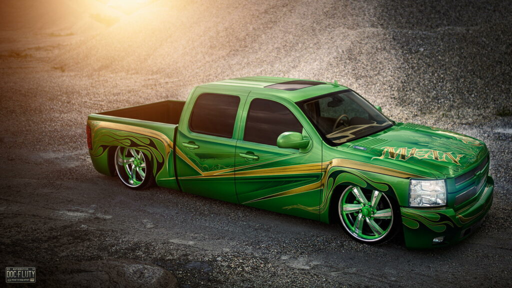 Vibrant Green Customized Chevrolet Silverado Lowrider Wallpaper