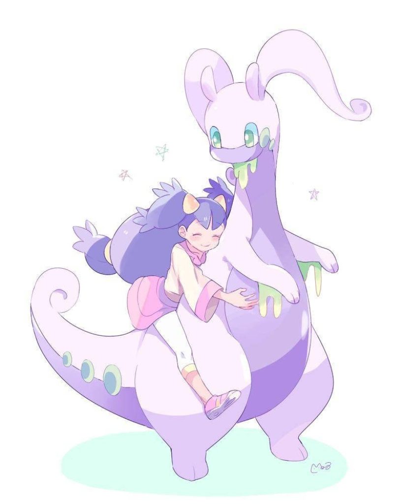 Anime style wallpaper of Pokémon trainer Iris hugging her Dragon-type Goodra with stars