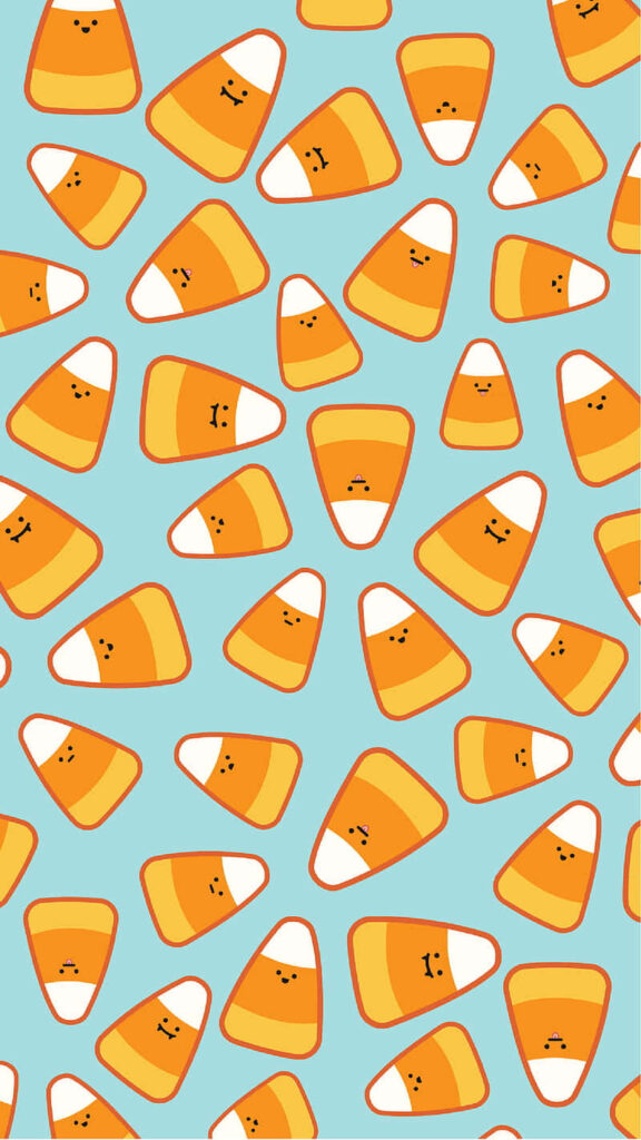 Adorable Candy Corn Wallpaper Background on Soft Mint Canvas