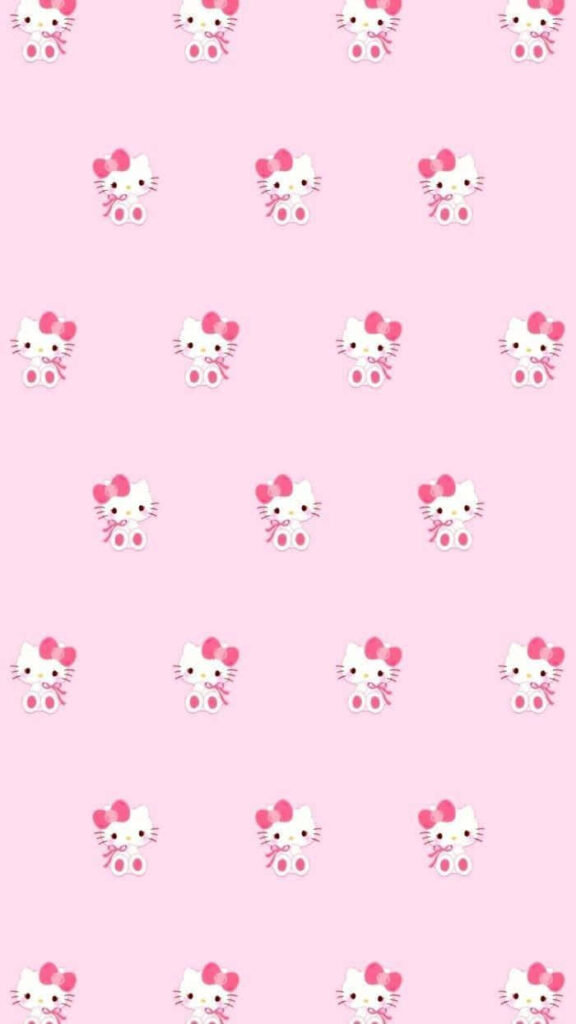 Charming Hello Kitty Wallpaper: Cute Faces on Soft Pink Background
