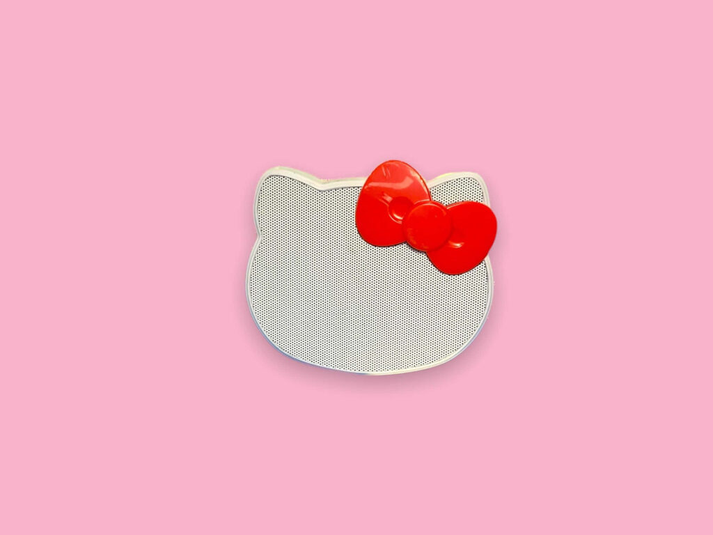 Cute Hello Kitty Wallpaper: Iconic Head & Red Bow on Soft Pink