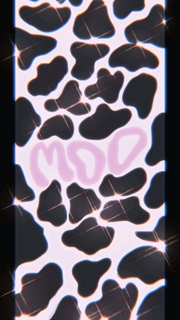 Bold cow print wallpaper with black spots white background and playful pink glossy moo text