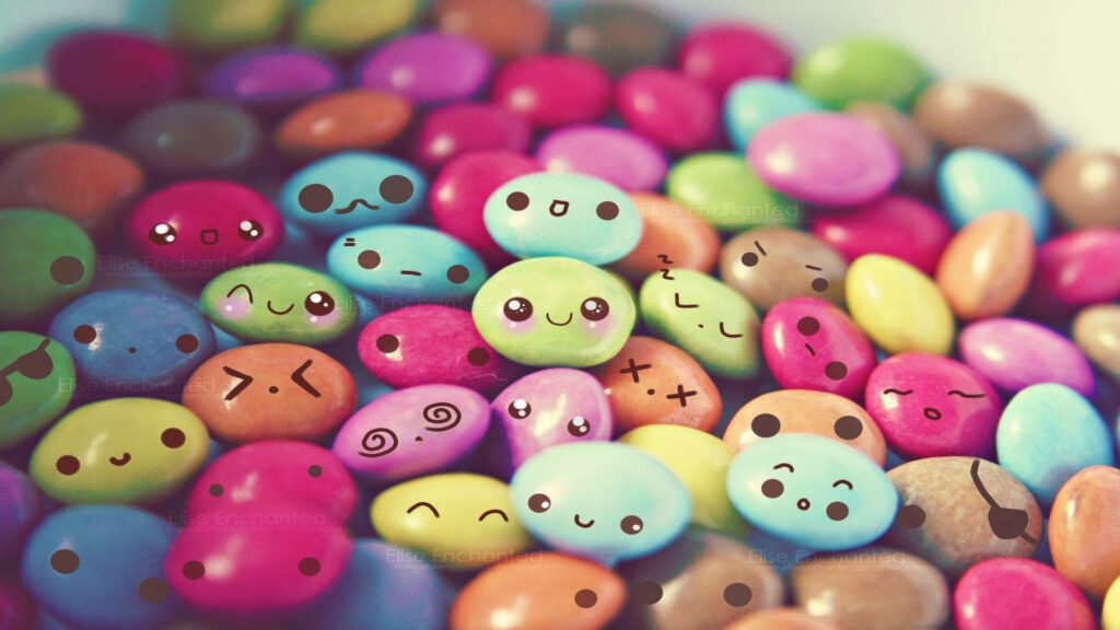 Whimsical Anime Smarties: A Delightfully Vibrant Candy Fantasy Wallpaper