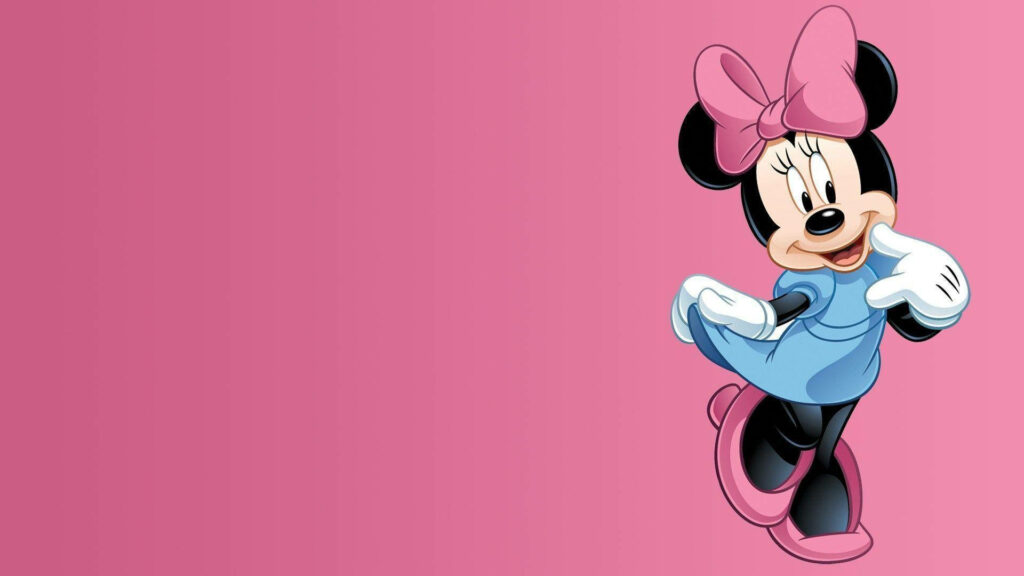 Minnie Mouse Strikes a Cute Pose in Pretty Pink and Blue Attire Wallpaper