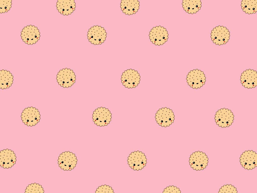 Sweet and Playful: Charming Cartoon Biscuits on a Baby Pink Background Wallpaper