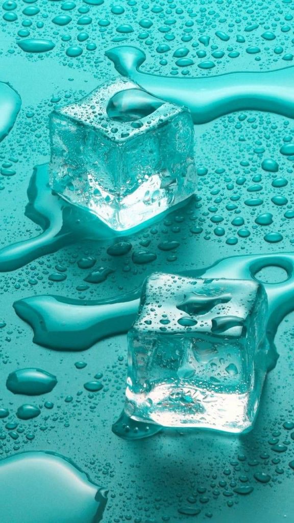 Two melting cyan ice cubes on wet surface with water droplets crisp minimalist wallpaper background