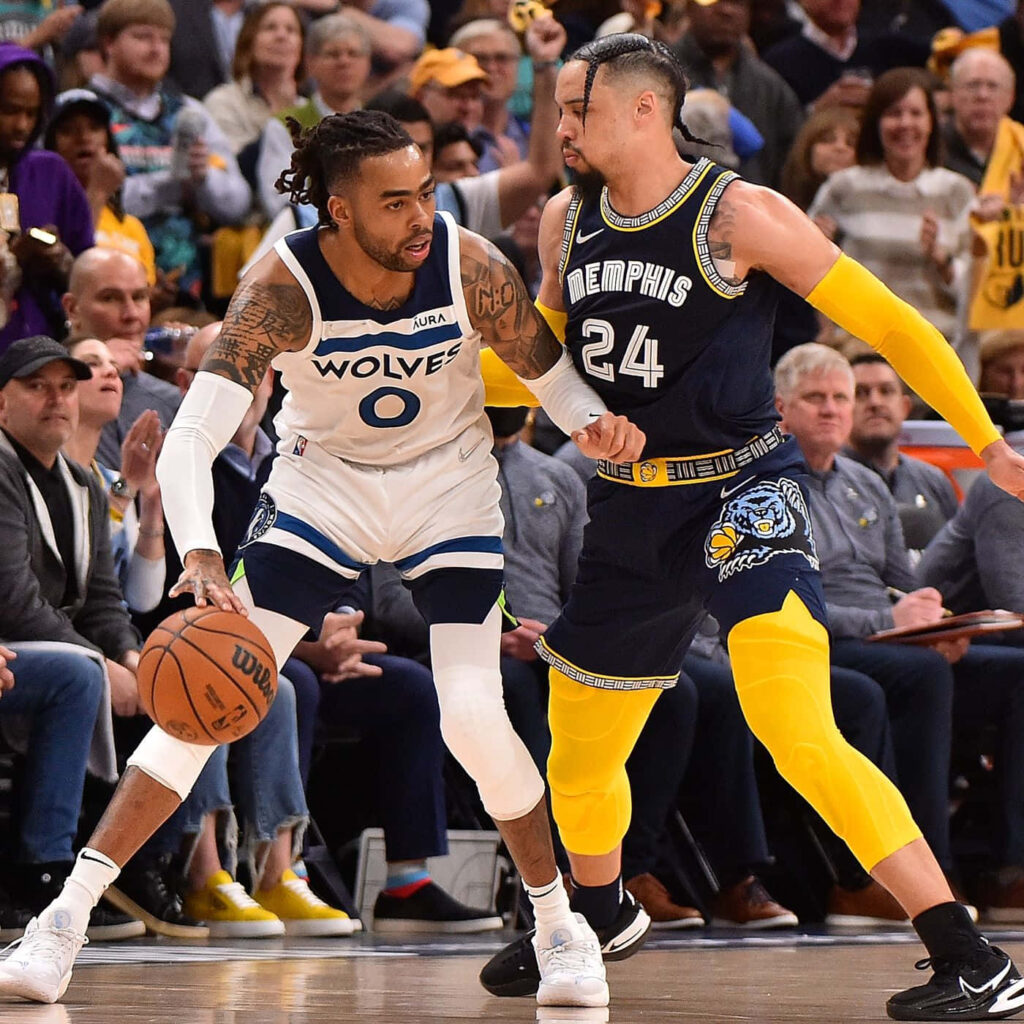 DAngelo Russell Timberwolves guarded by Dillon Brooks Grizzlies intense NBA basketball action wallpaper