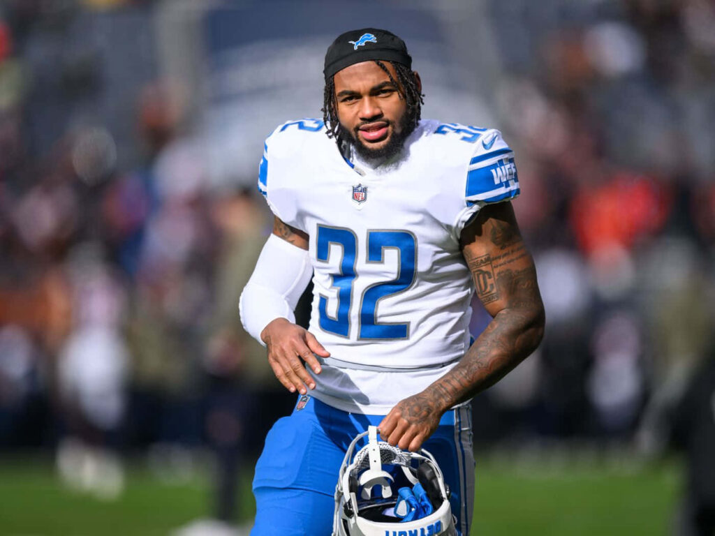 DAndre Swift Detroit Lions running back focused on field in white blue uniform NFL wallpaper