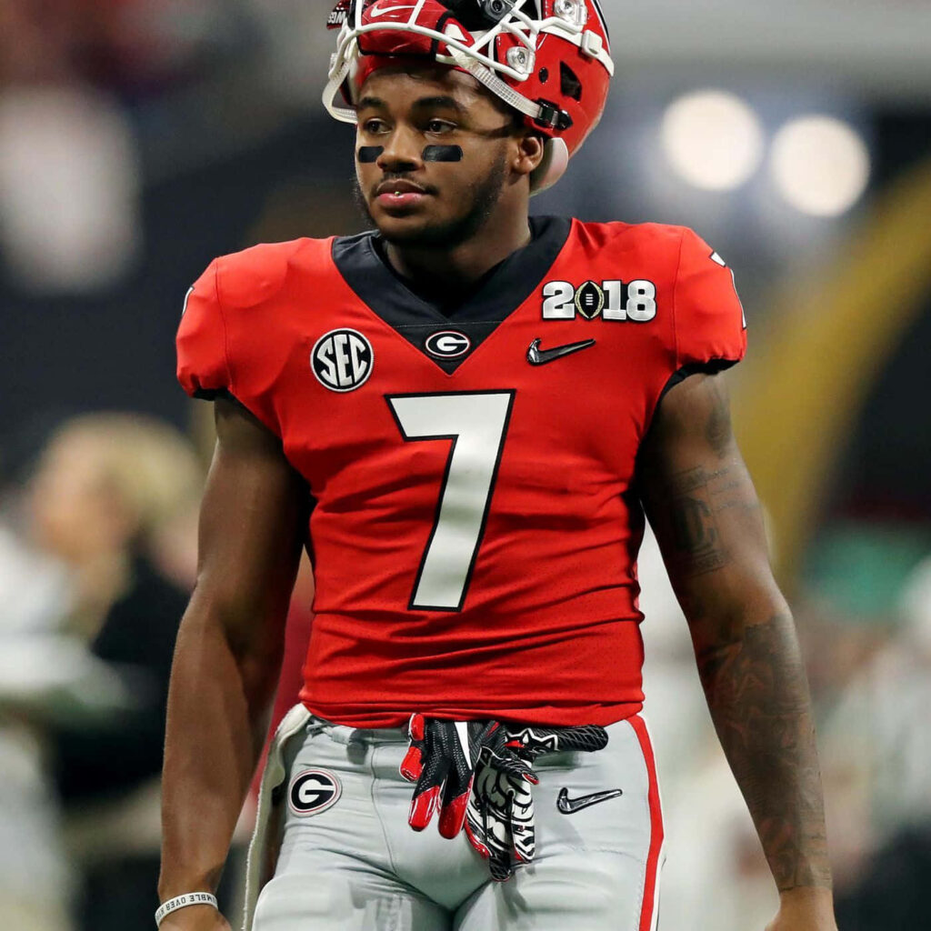 DAndre Swift in red Georgia football uniform number 7 dynamic wallpaper showing focus and energy