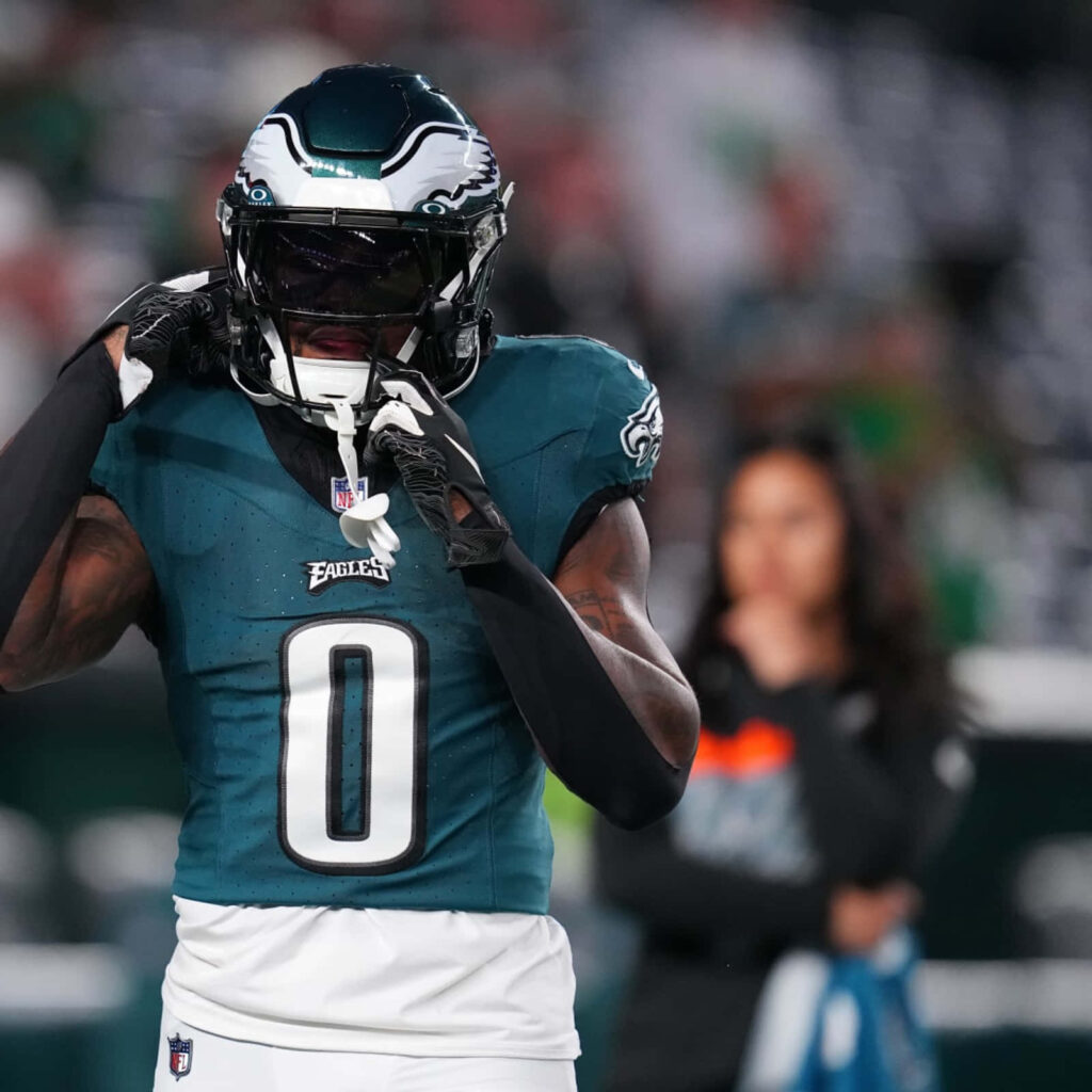 DAndre Swift Philadelphia Eagles in midnight green helmet focus stadium background wallpaper