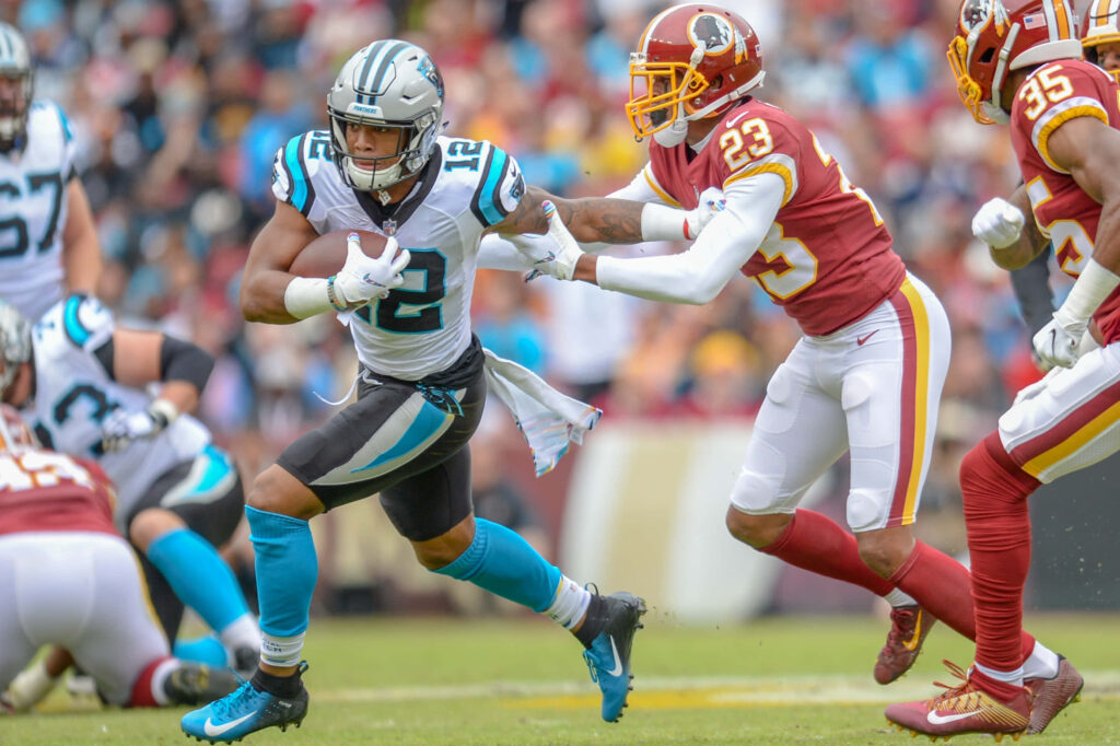 Carolina Panthers DJ Moore races with football vs Washington Redskins defenders NFL action wallpaper