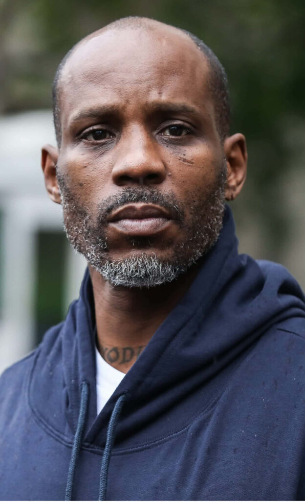 DMX rapper candid portrait navy hoodie intense expression natural light gritty style wallpaper background