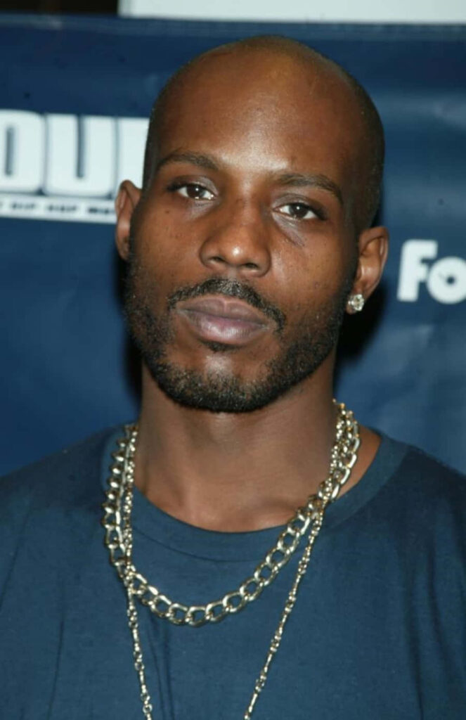 DMX close-up portrait wallpaper with intense expression minimal jewelry dark blue hip-hop style