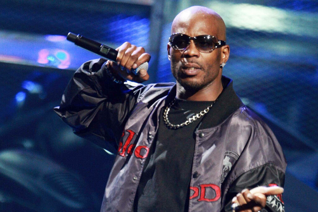 DMX mid performance in dark streetwear chrome chain bold lighting urban backdrop wallpaper