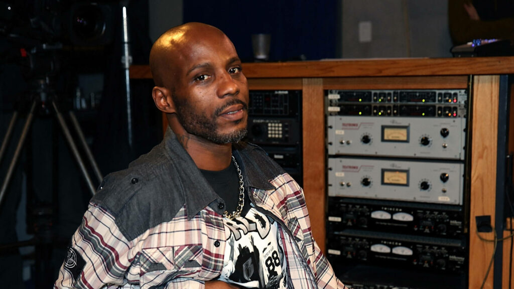 DMX in studio with professional audio gear wearing streetwear intense expression hip hop legend Wallpaper