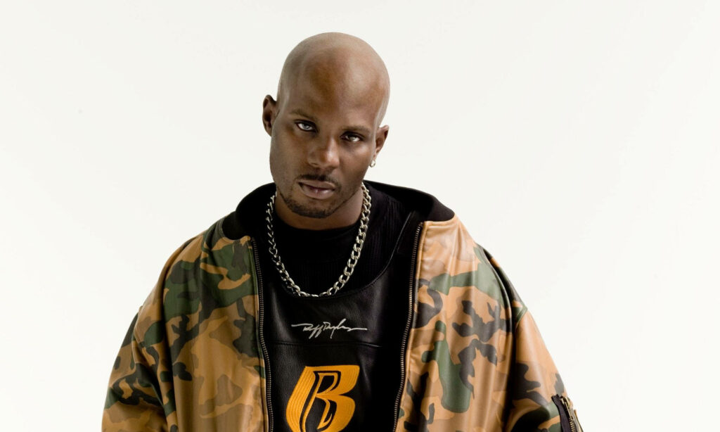 DMX portrait in camouflage jacket black shirt chunky chain intense expression white background wallpaper