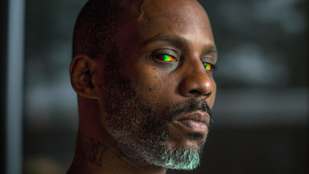 DMX close-up portrait with intense Rasta eyes dark moody background digital art wallpaper