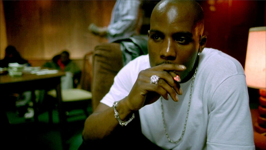 DMX rapper wallpaper intense gaze warm tones street style white t-shirt chains rings gritty urban background