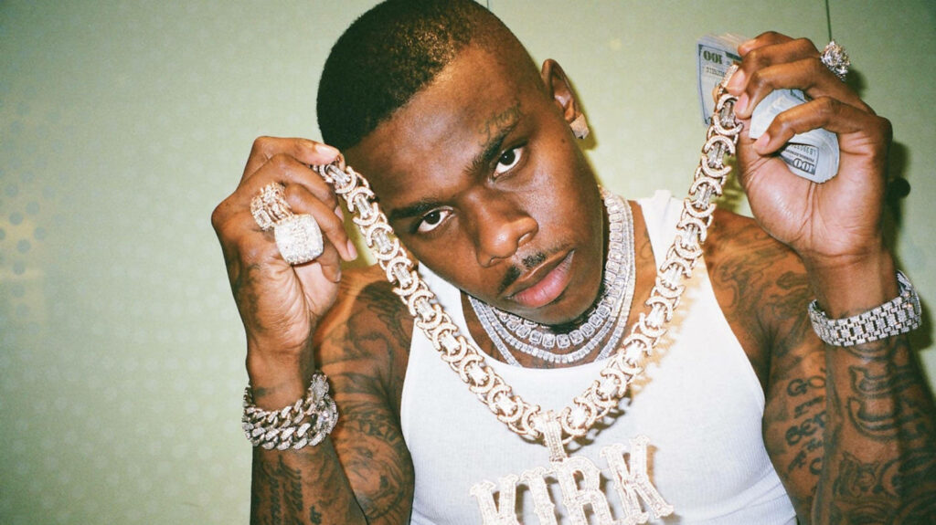 DaBaby rapper wearing diamond chain and tattoos holding cash in white tank top hip hop wallpaper