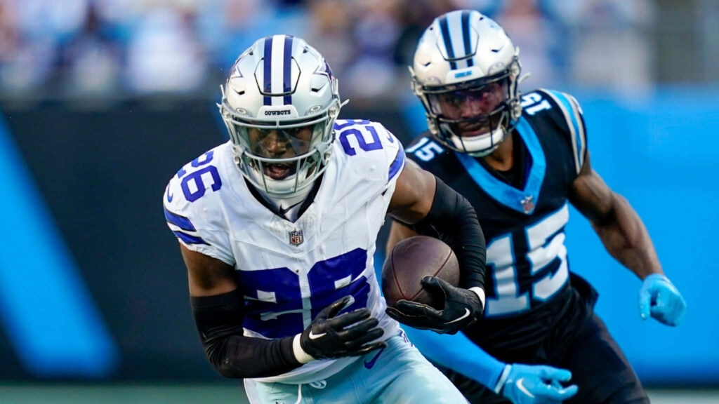 Dallas Cowboys cornerback DaRon Bland intercepts pass from Carolina Panthers wide receiver Jonathan Mingo Wallpaper