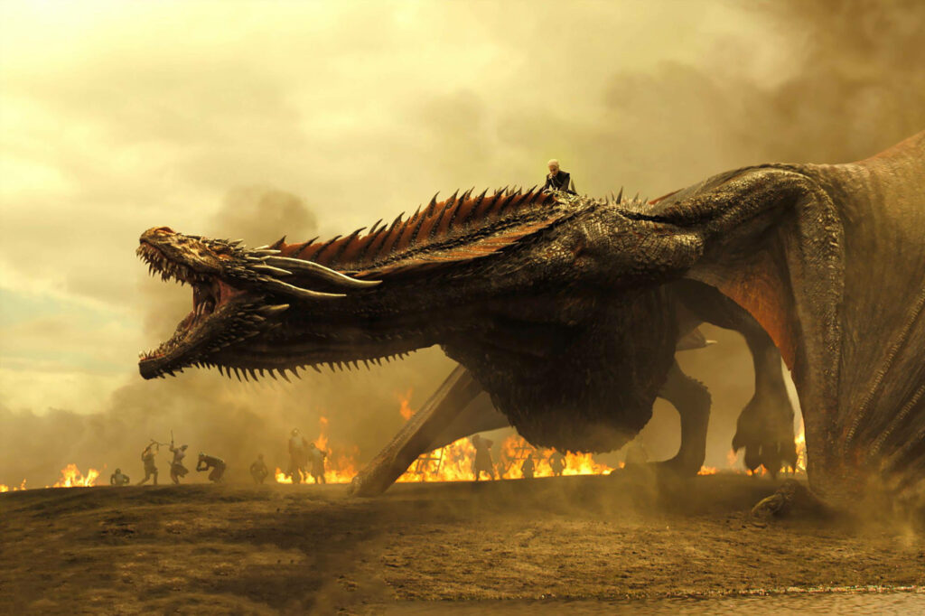 Daenerys Targaryen riding dragon unleashing fire on battlefield with fleeing soldiers background Wallpaper