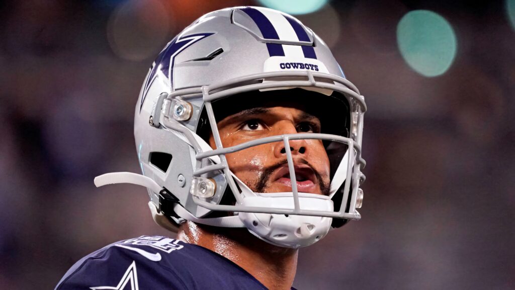 Dak Prescott Dallas Cowboys headshot sharp focus intense expression silver helmet navy jersey Wallpaper
