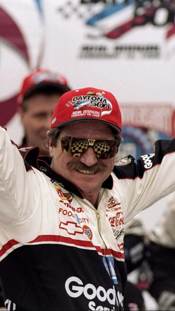 Dale Earnhardt celebrates Daytona 500 win wearing racing suit cap mirrored sunglasses wallpaper