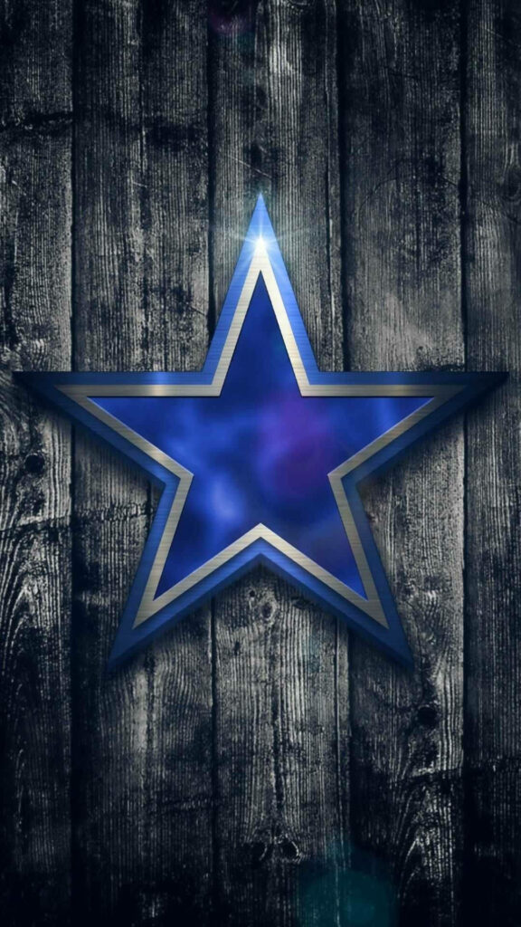 Dallas Cowboys blue star logo metallic sheen on weathered gray wood background wallpaper