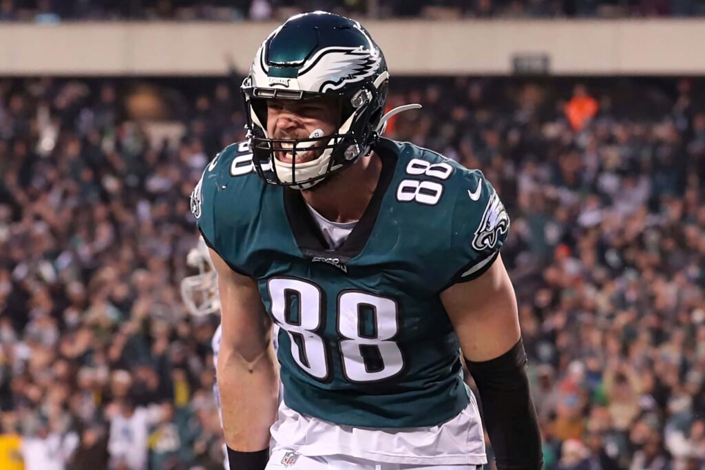Dallas Goedert Philadelphia Eagles tight end in action vibrant green white uniform stadium crowd Wallpaper